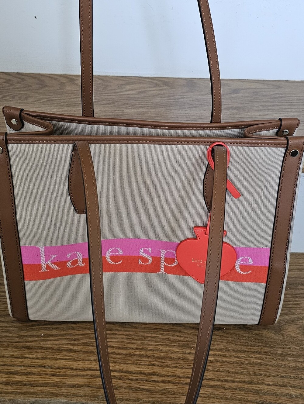Kate Spade Canvas Tote with Brown Leather Trim and Pink/Red Accent